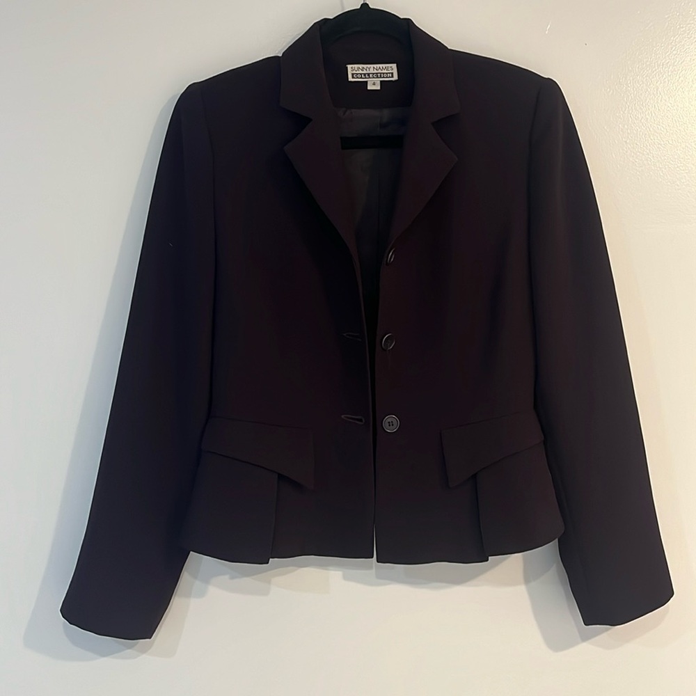 Sunny Names eggplant blazer with peplum bottom. Like new